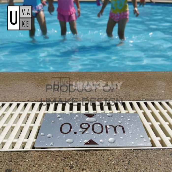 Multiple stainless steel pool safety signs displayed together