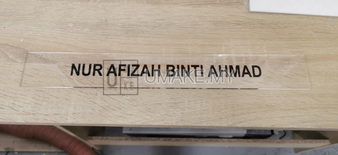 A sleek acrylic signage with direct UV-printed organizational chart (carta organisasi) in clear, professional layout, mounted on a wall.