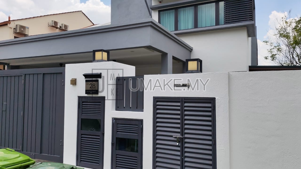 A sleek stainless steel house number plate installed on a clean white wall, showcasing laser-cut custom numbering with a modern minimalist design.