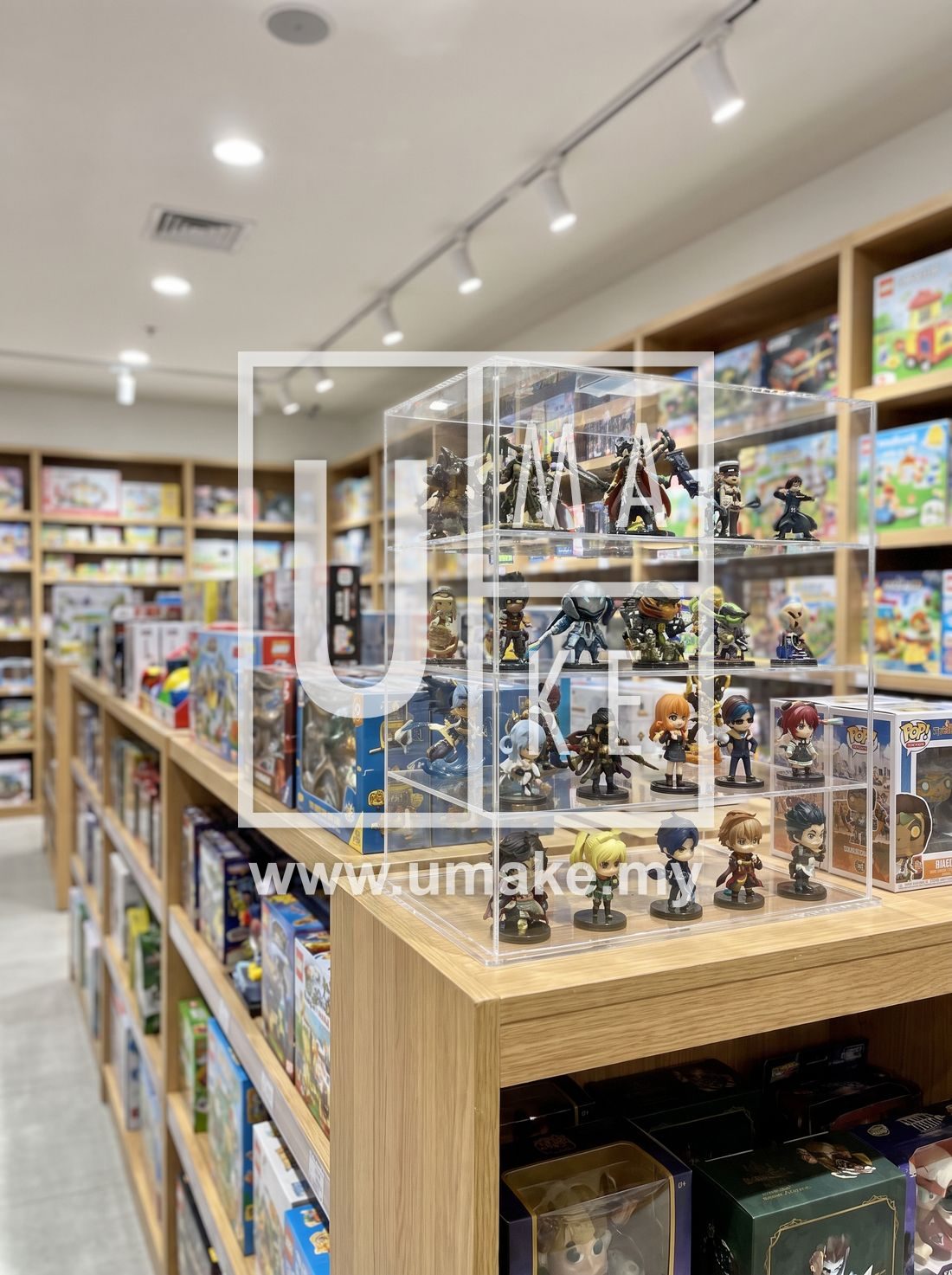 Clear acrylic display case holding collectible figures