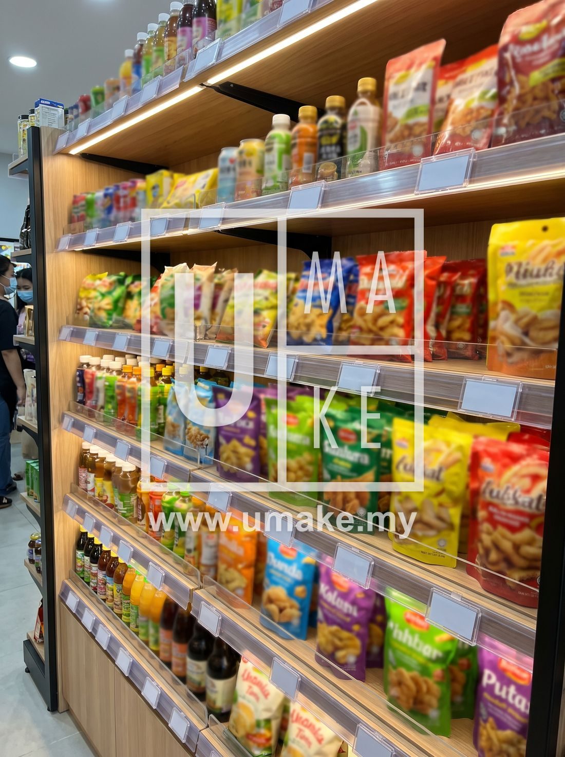 Retail shop shelf with clear acrylic price-tag holders