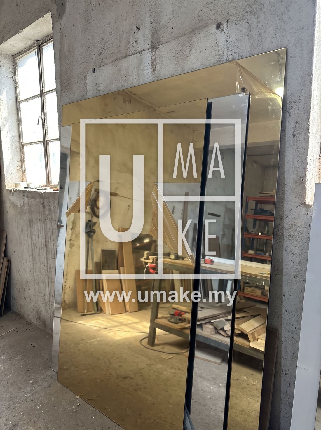Gold and silver mirror acrylic sheets in a workshop