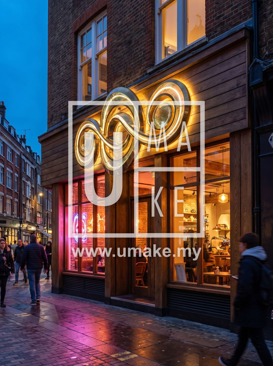 A bright storefront at dusk with a large custom illuminated logo sign on the facade