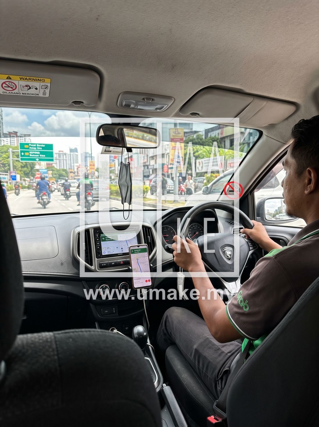 No smoking sticker inside a Malaysian e-hailing car