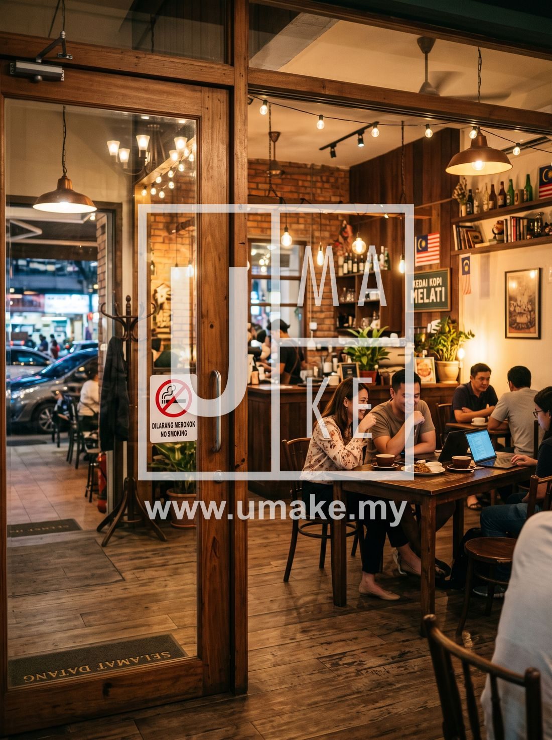 No smoking sign on the glass door of a Malaysian cafe