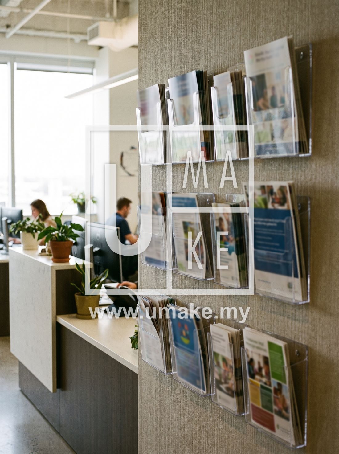 Wall-mounted acrylic brochure holders in an office