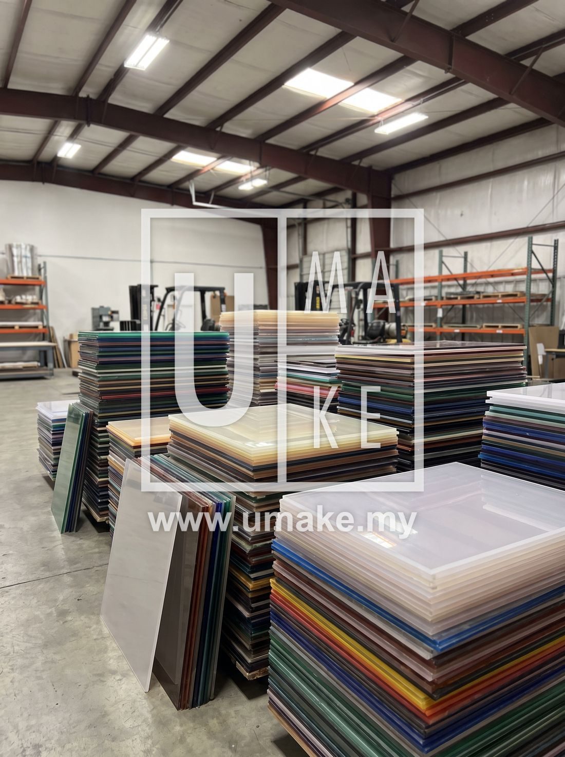 Stacks of colourful acrylic sheets in a warehouse