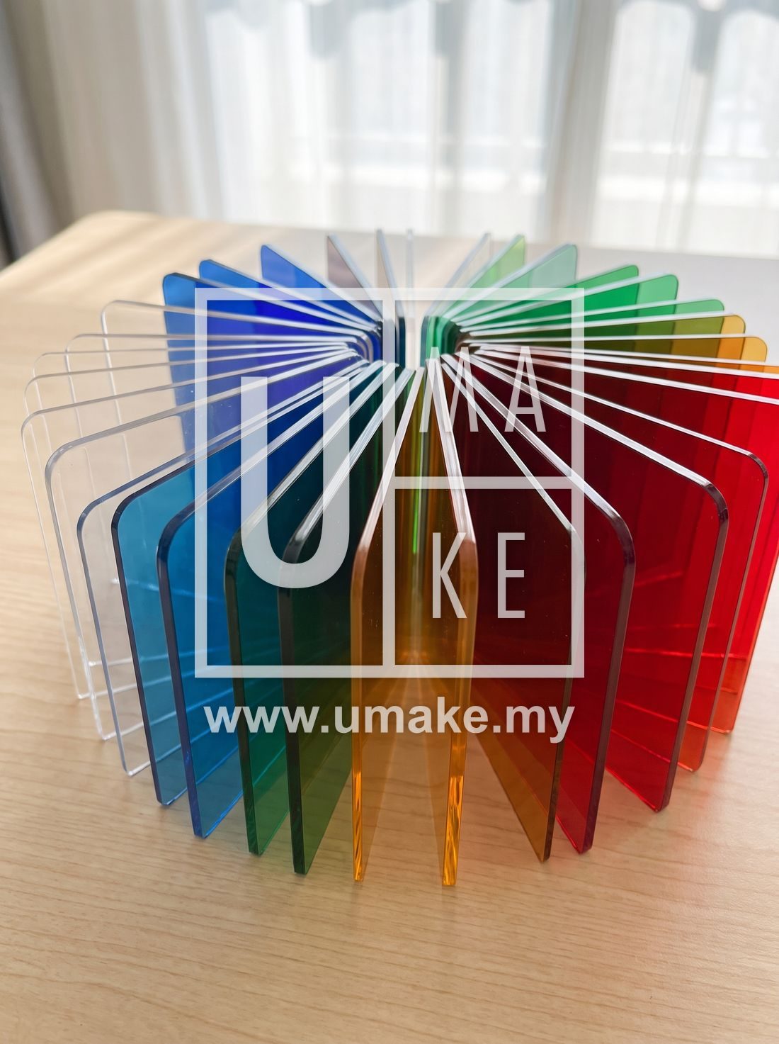Clear and coloured acrylic sheets fanned out