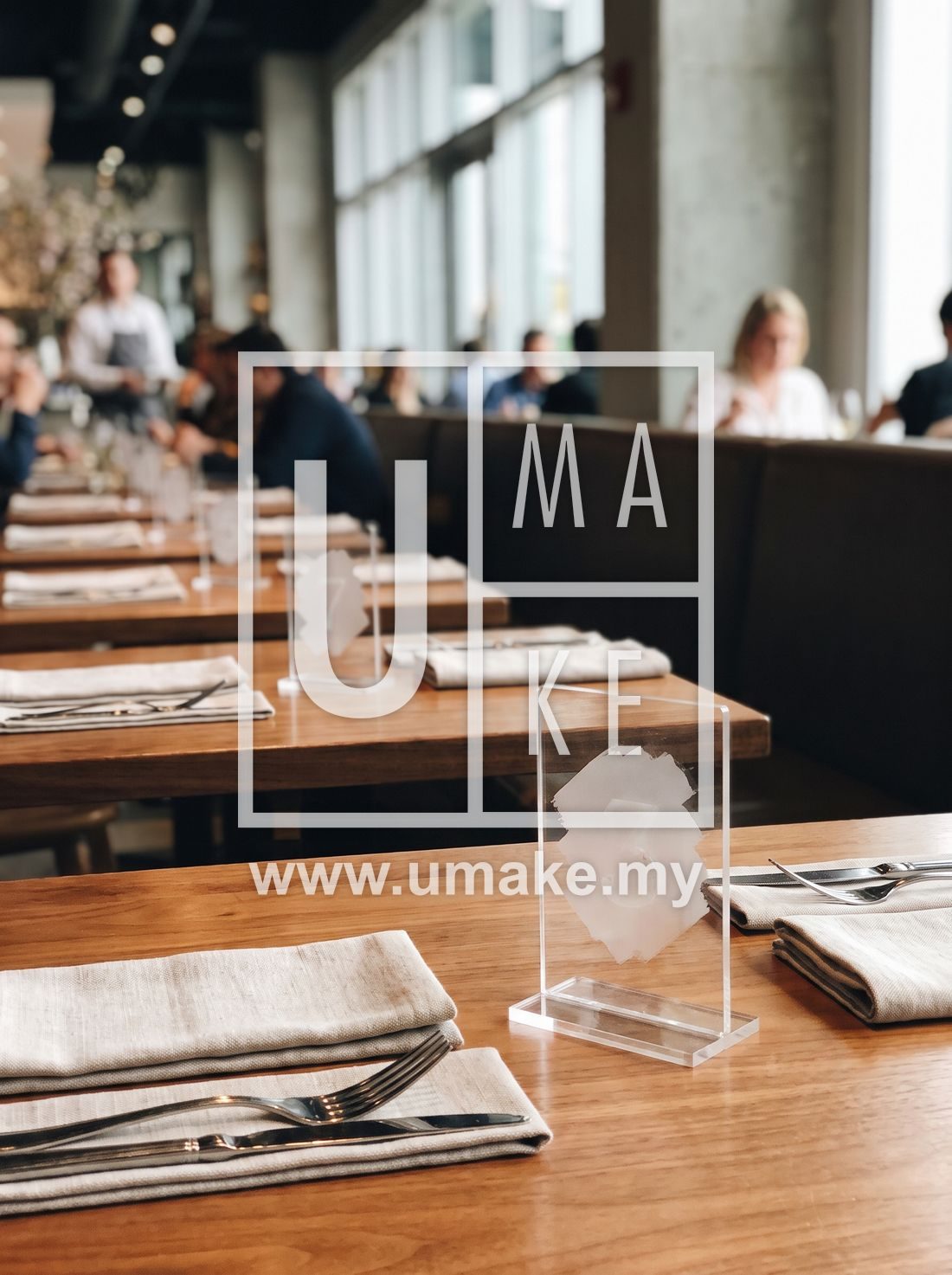 Acrylic table number stands on restaurant dining tables