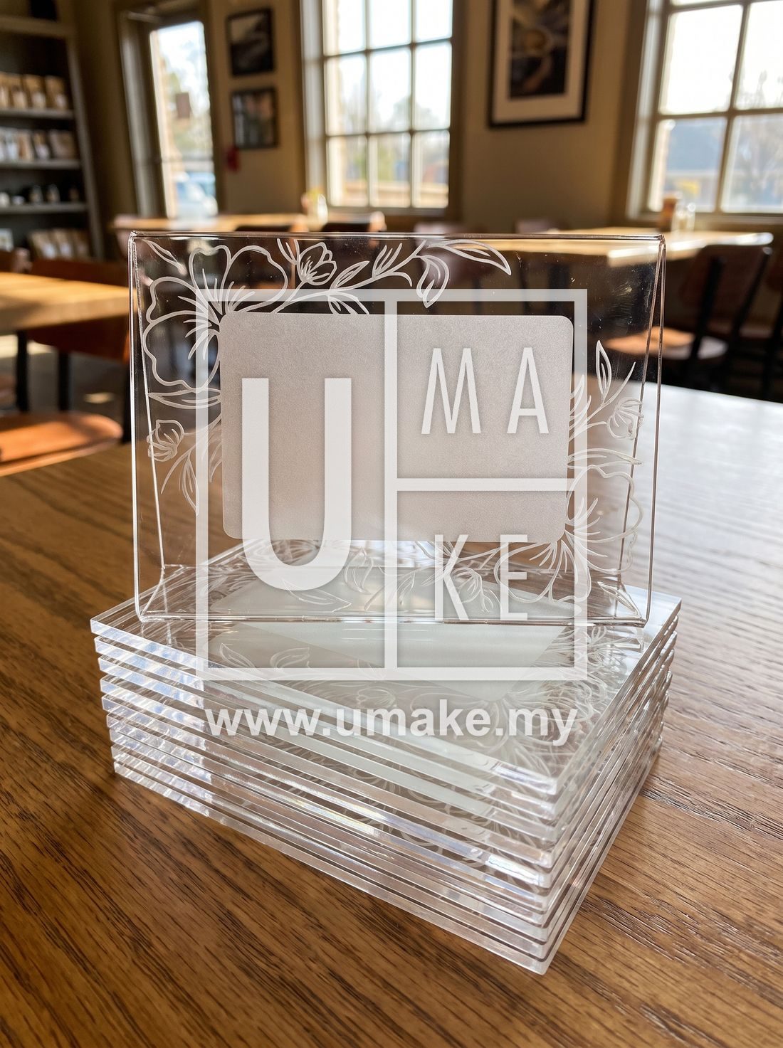 A stack of custom acrylic table number holders
