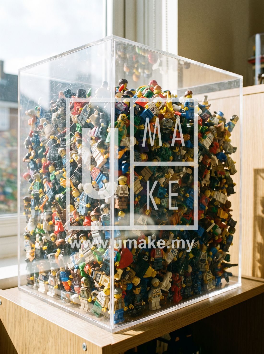 A clear acrylic display case full of colourful Lego minifigures