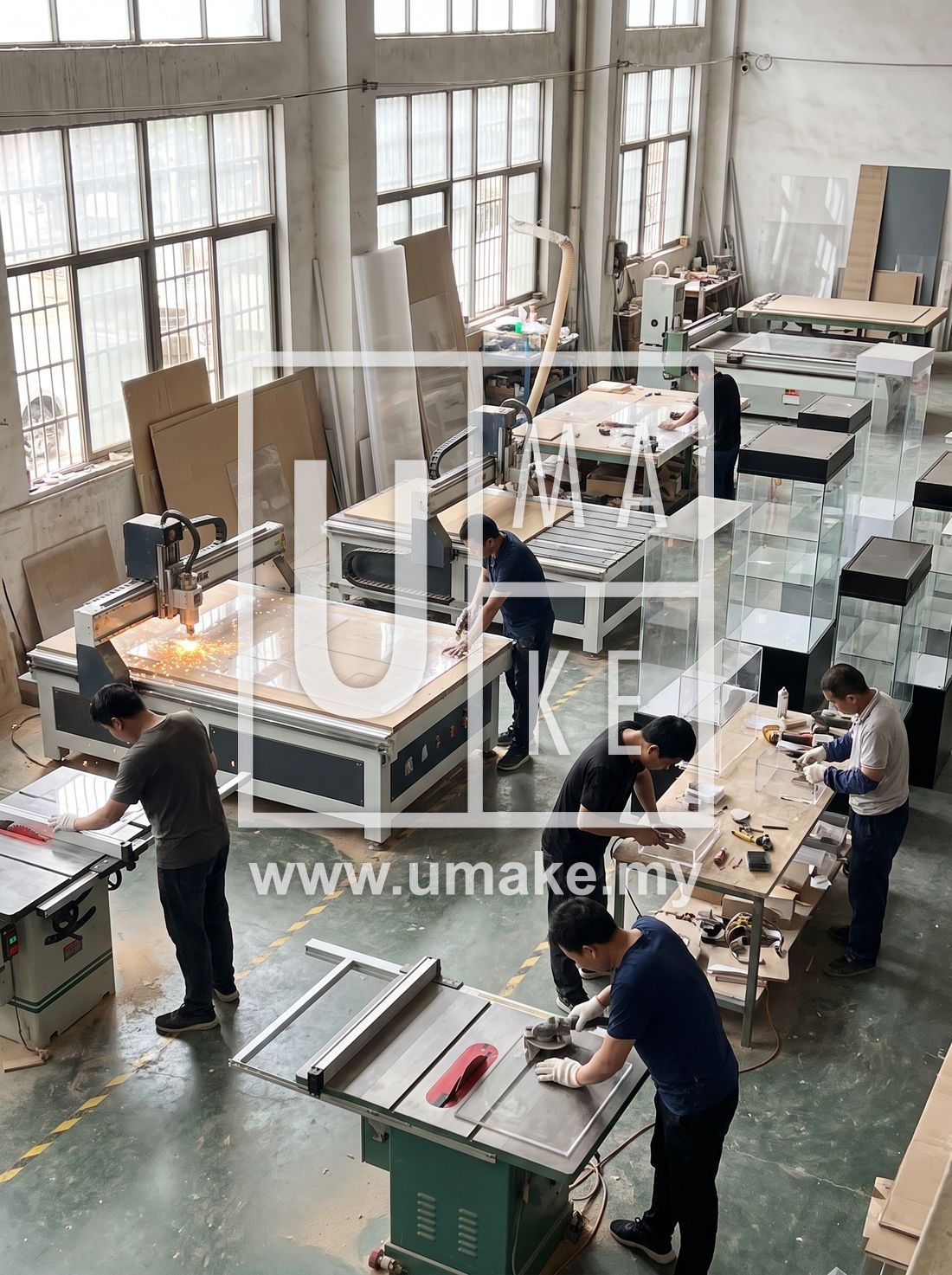 An acrylic display case workshop with cases being cut