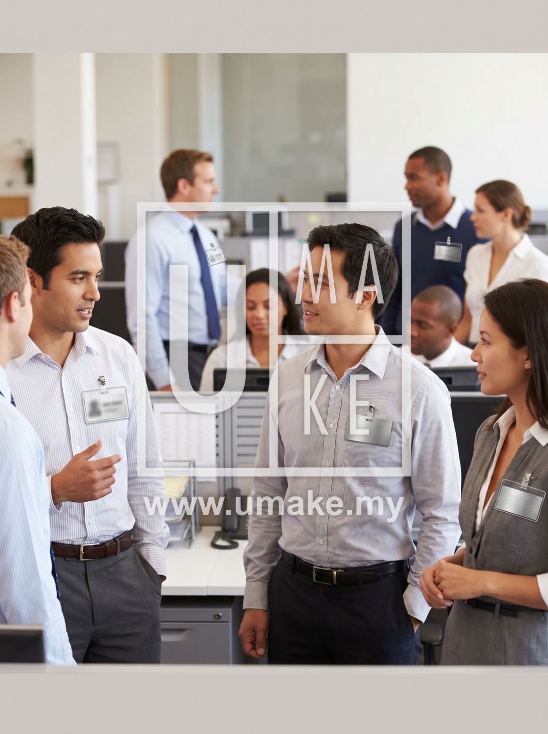 Staff wearing acrylic and metal name tags in an office