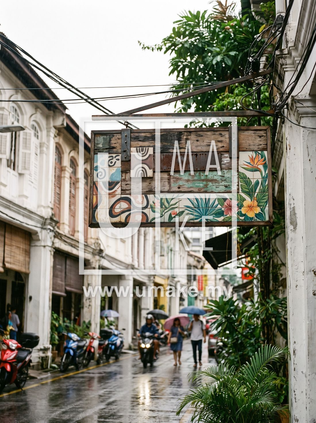 A custom shopfront signboard on a Kuala Lumpur street