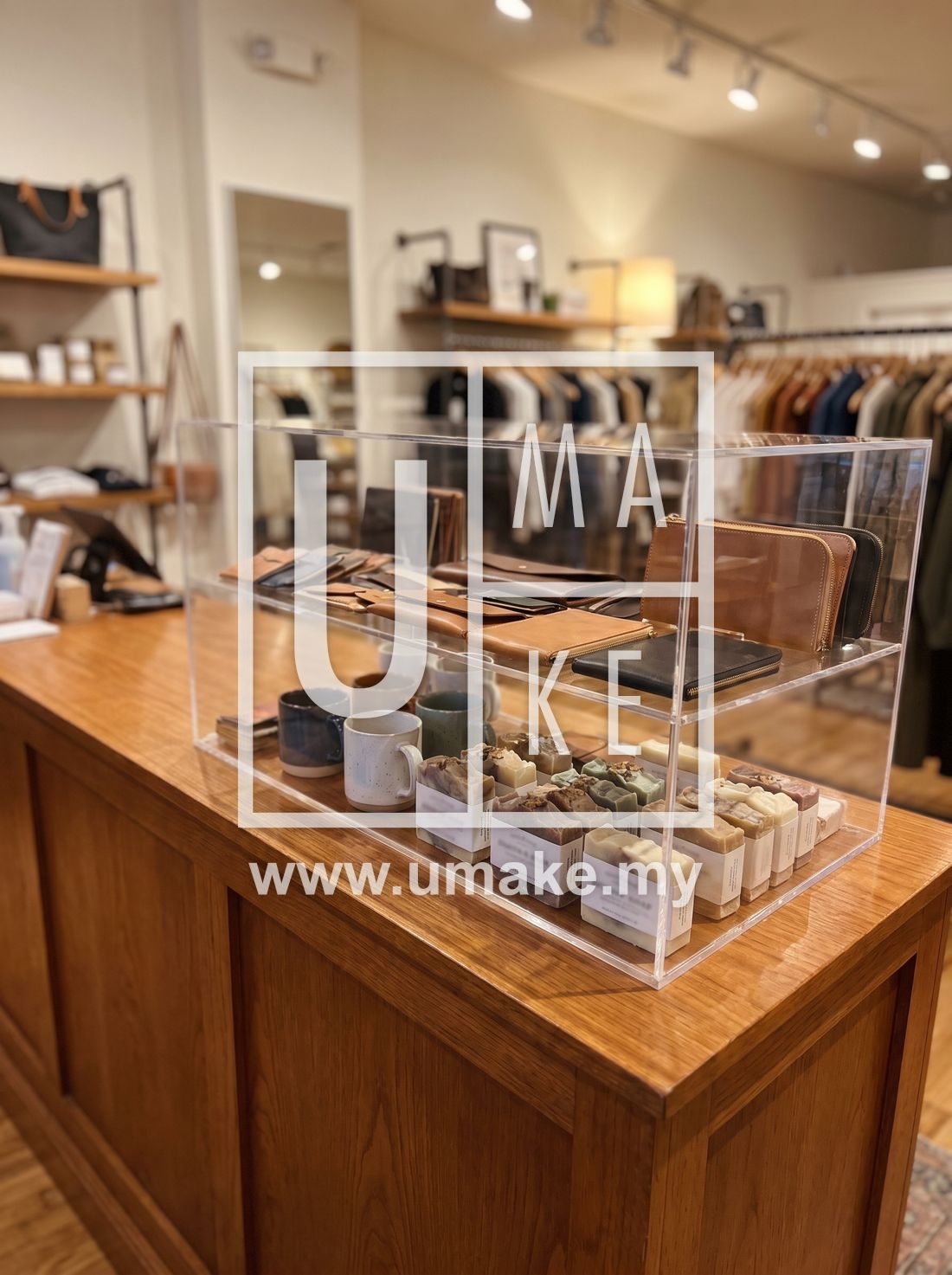 A retail counter with an acrylic showcase of products