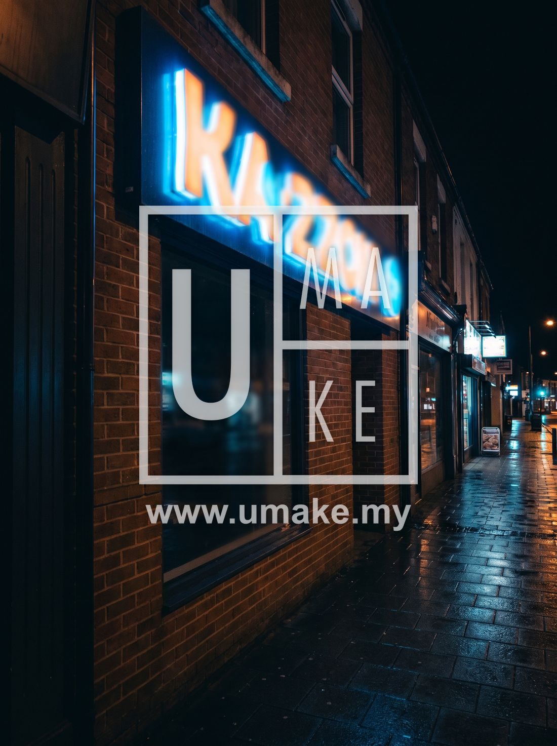 A glowing LED channel letter signboard on a shopfront at night
