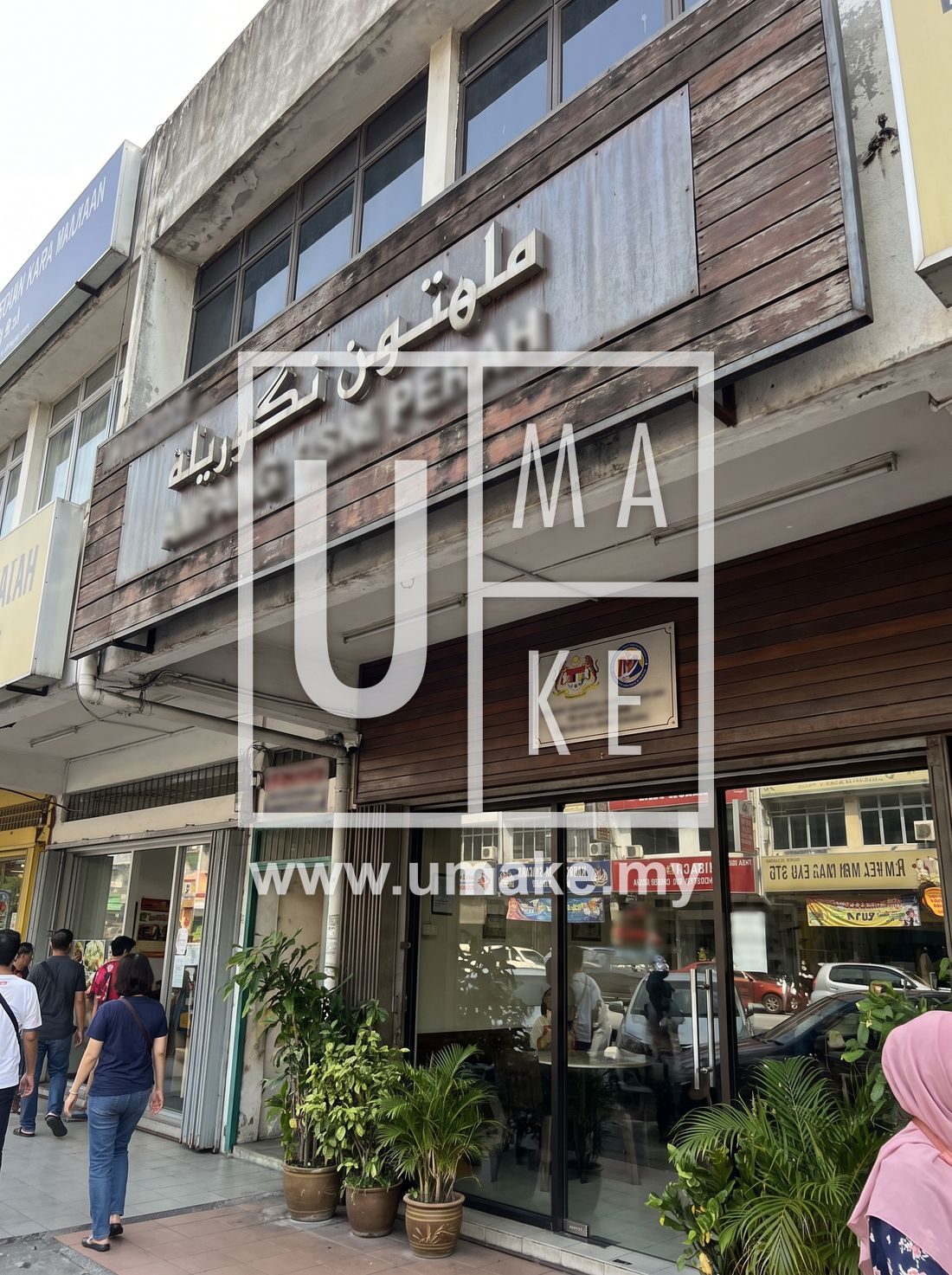 An Ampang shop with a compliant business signboard