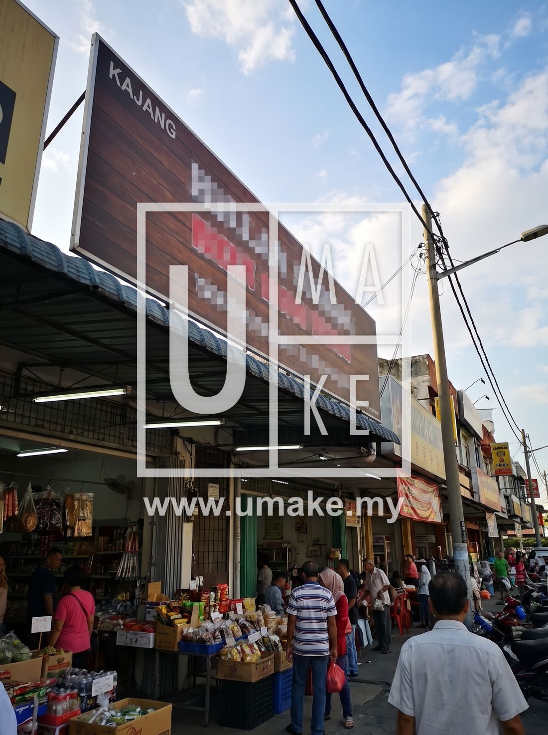 A compliant signboard on a Kajang shop