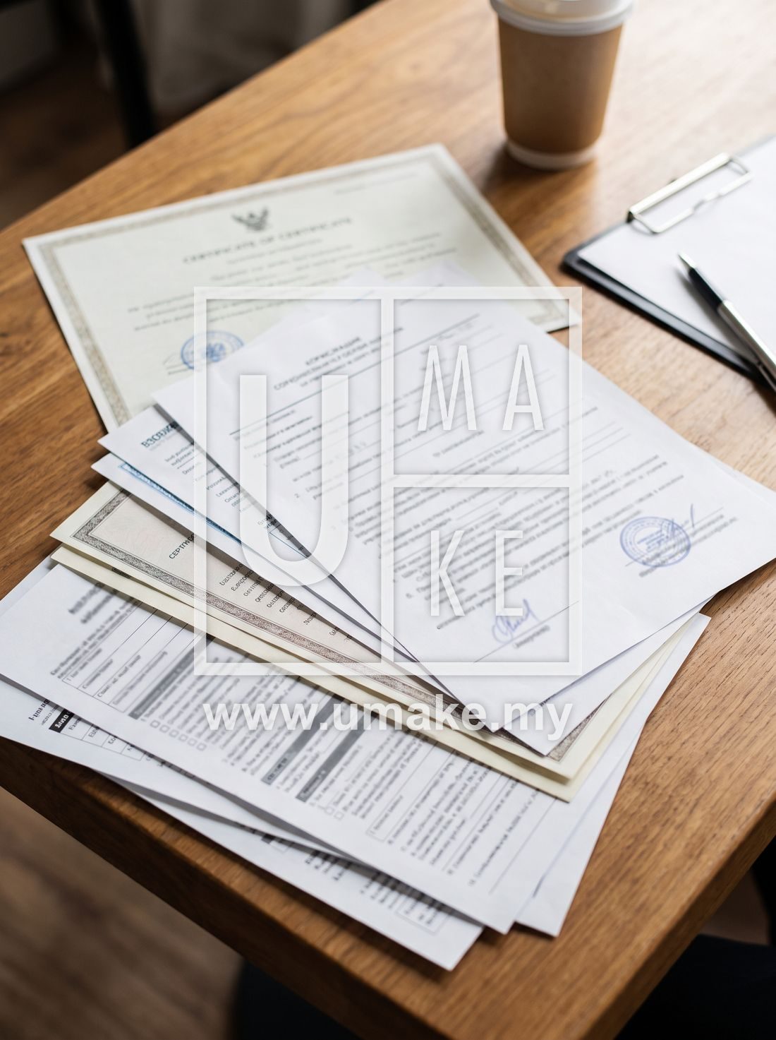 Business signboard licence documents on a table
