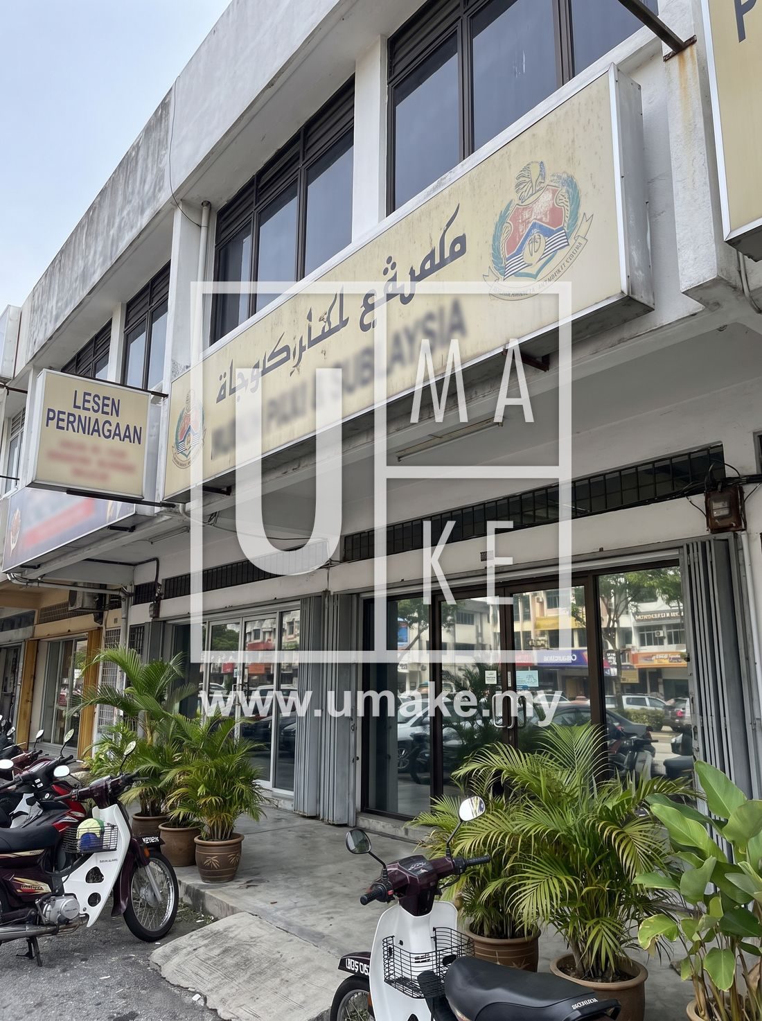 A Subang Jaya shopfront with a licensed signboard