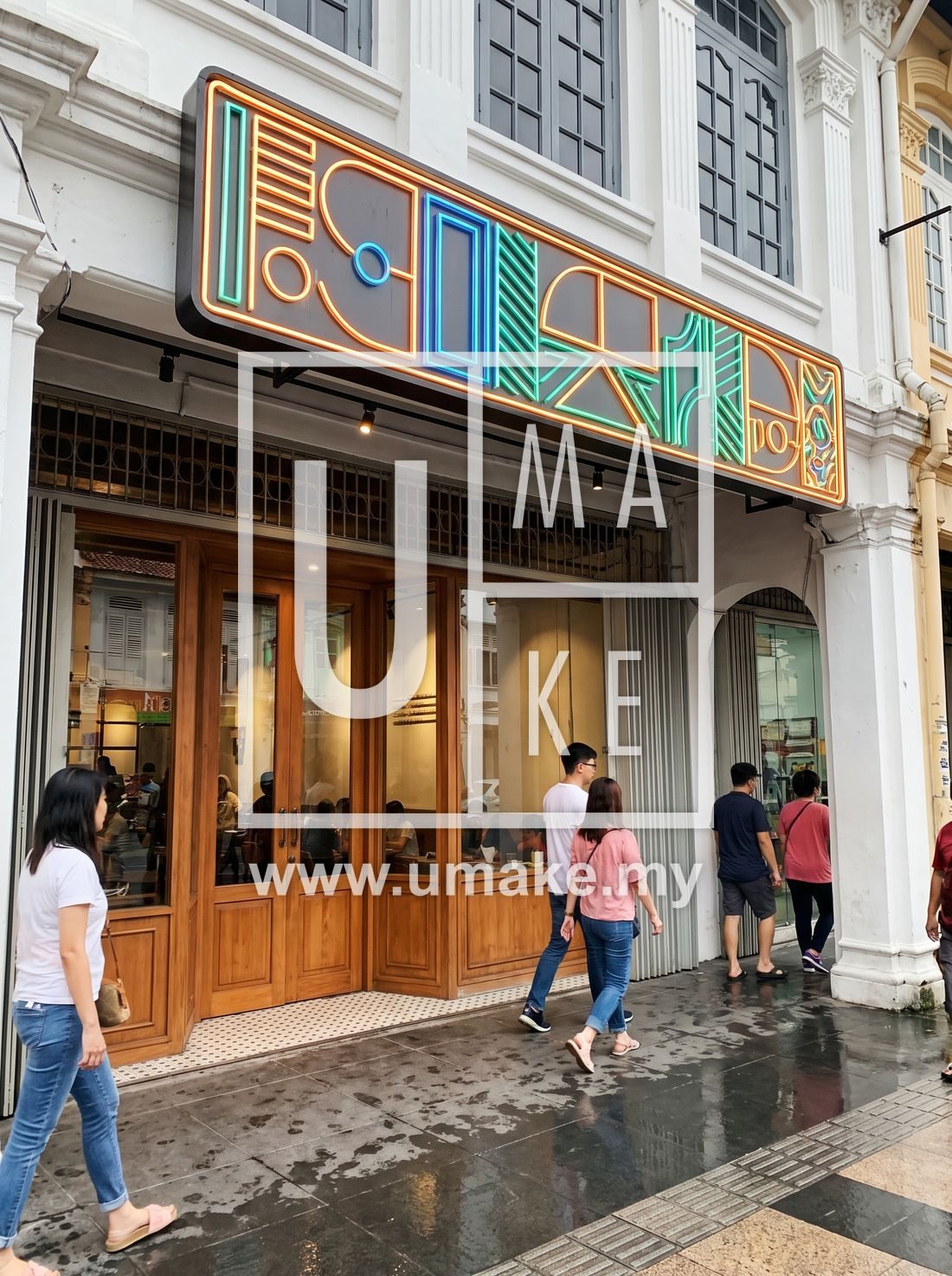 A KL shopfront with a bright new custom signboard
