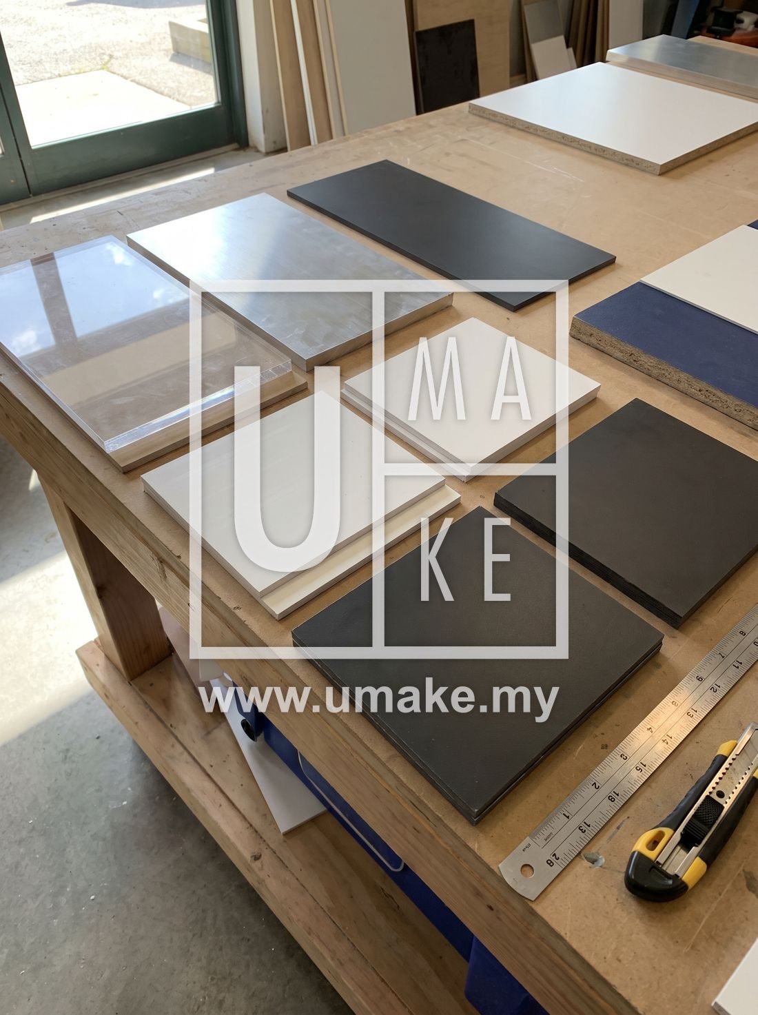 Different signboard materials laid out: acrylic, metal, PVC