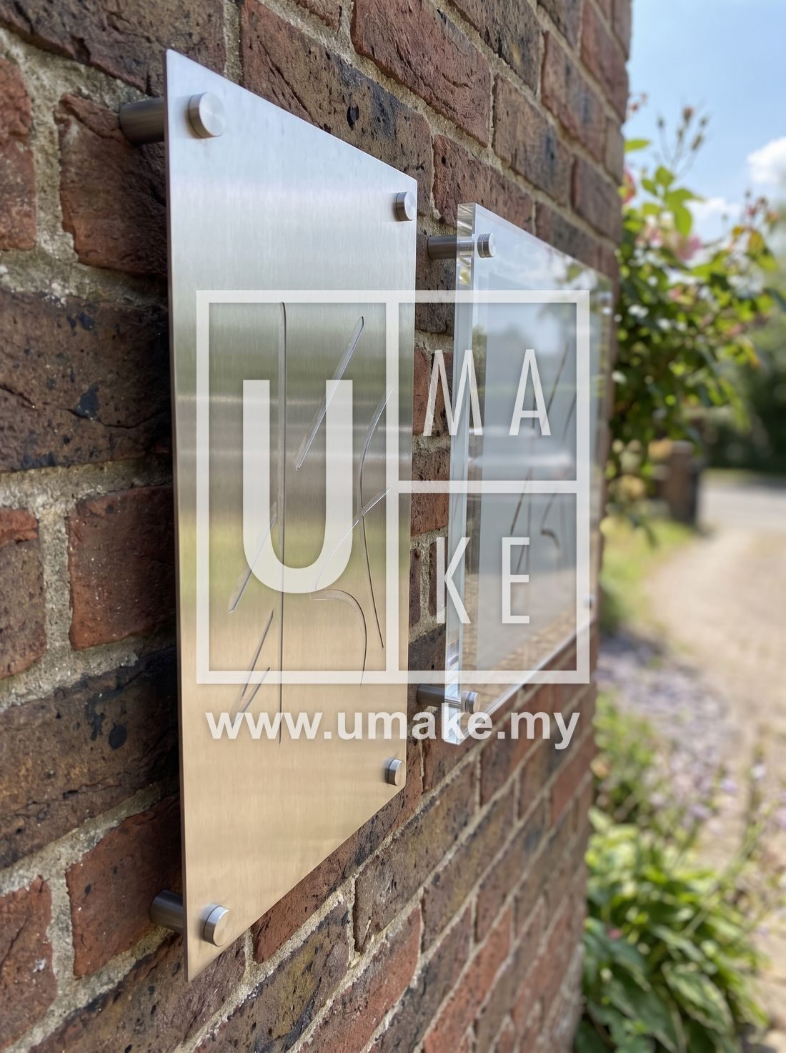 A stainless steel sign next to an acrylic sign