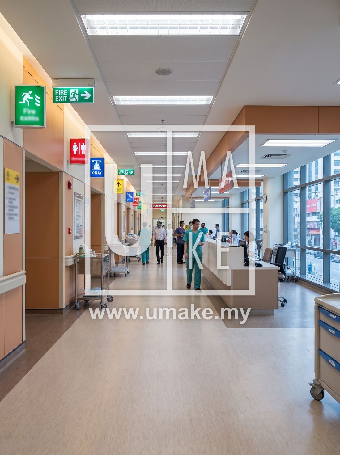 Hospital corridor with illuminated exit and directional safety signs